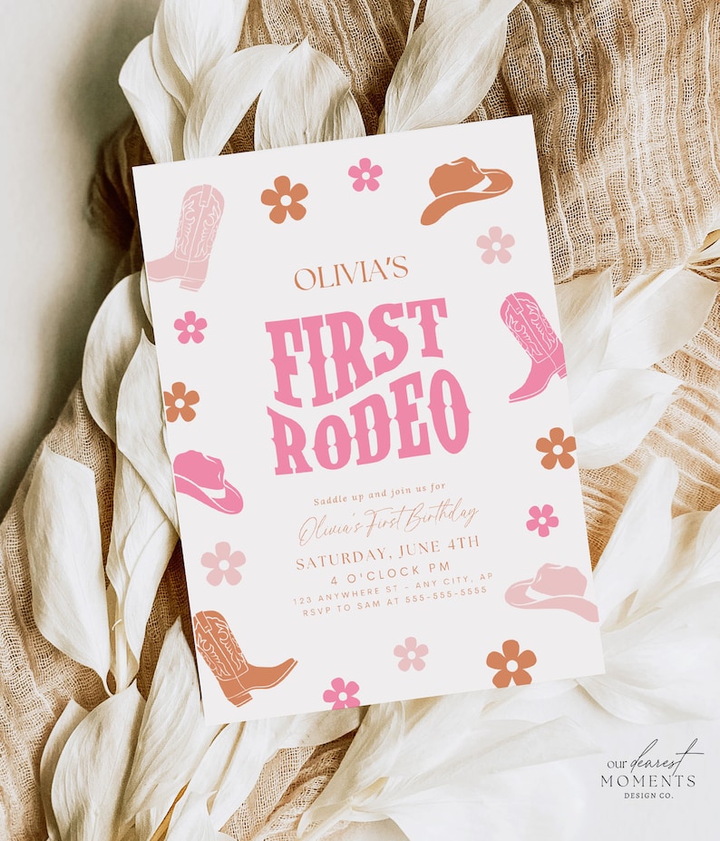 May include: A pink and white invitation for a first rodeo party. The invitation features a pink cowboy boot, a pink cowboy hat, and the text "Olivia's First Rodeo".