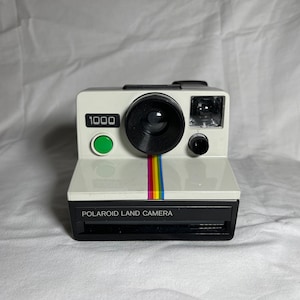 Polaroid 1000 Vintage Instant Film camera SX-70 cartridges
