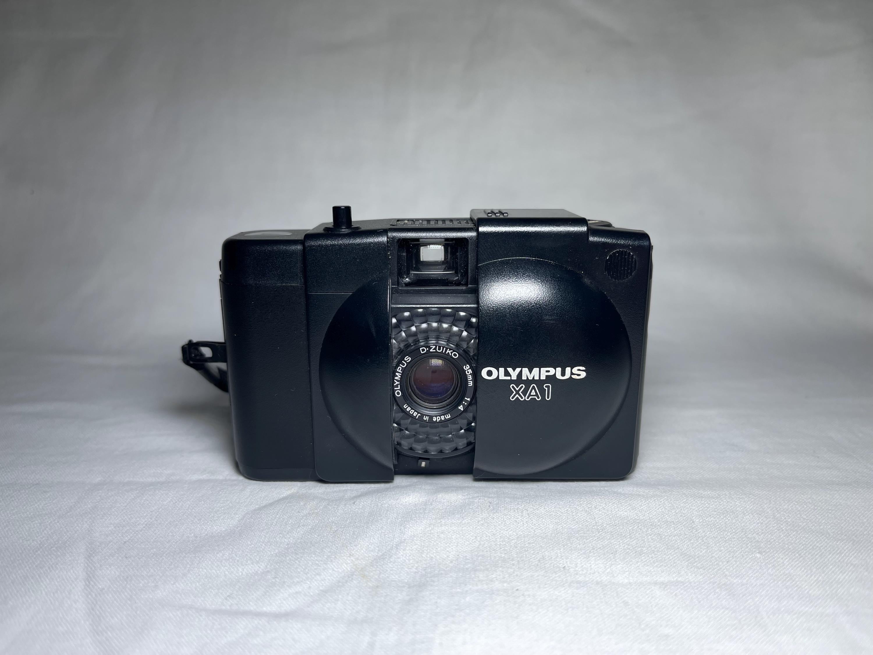 オリンパス　XA ブラック オリンパス XA[記憶に残る名機の実像] Vol.09 - PRONEWS : 動画