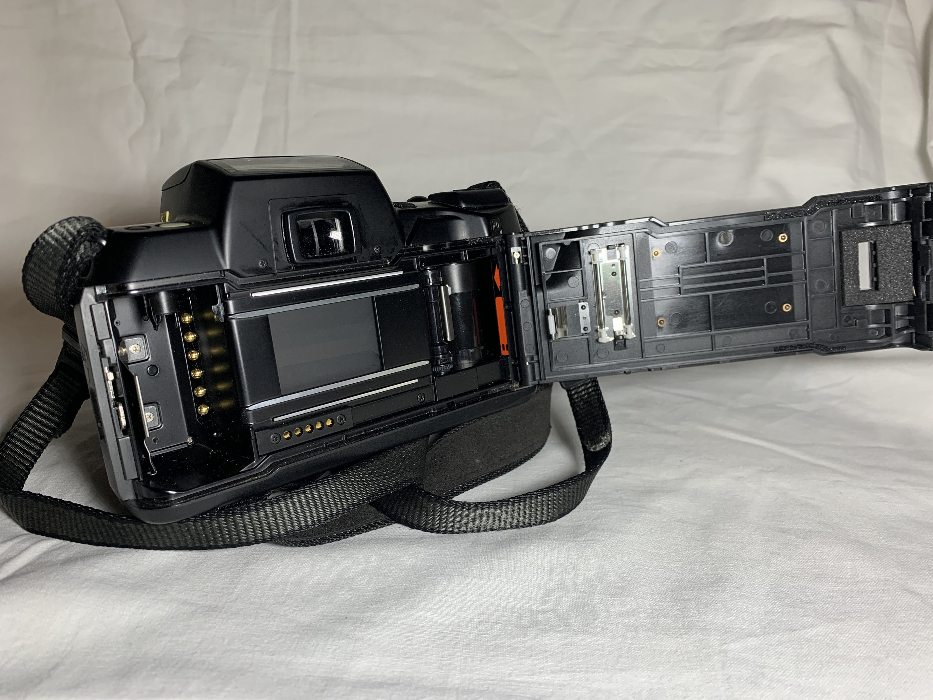 A quantity of vintage camera equipment to include; Pentax SF7, Canon
