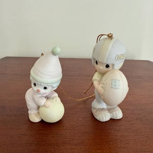 2 Precious Moments Ornament.