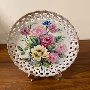 Vintage Porcelain Hand Painted Reticulated Floral Design Decorative Plate.