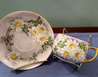 Antique Hand painted Eggshell porcelain Tea cup and Saucer.