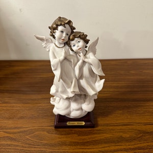 Vintage Giuseppe Armani Florence Singing Angel Figurine.