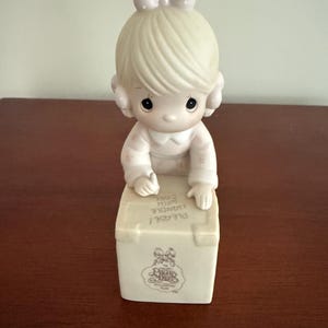 Precious Moments “Sharing is Universal” Figurine