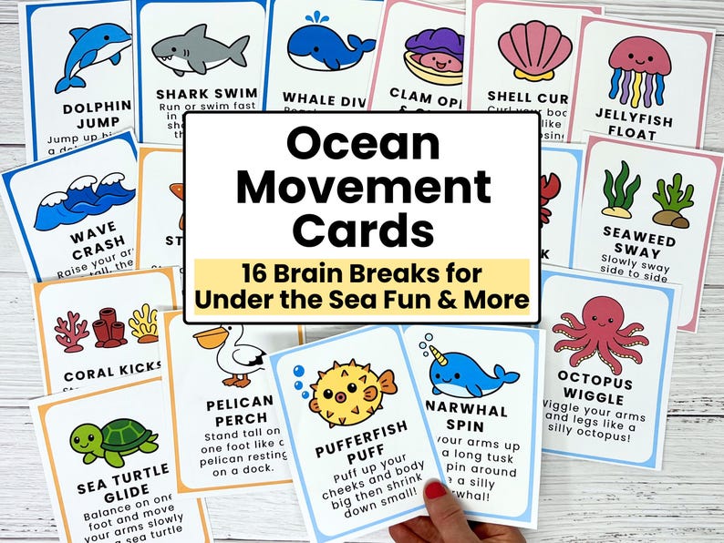May include: A collection of colorful Ocean Movement Cards with illustrations of sea creatures like dolphins, sharks, and jellyfish. The cards have text such as "Dolphin Jump" and "Octopus Wiggle". The central card reads "Ocean Movement Cards".