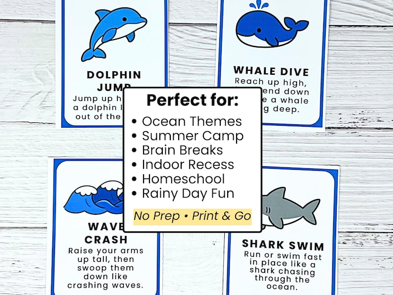 May include: Four blue and white cards with ocean-themed illustrations and instructions for physical activities. The cards feature a dolphin, whale, waves, and a shark. Text on the cards includes "Dolphin Jump," "Whale Dive," "Wave Crash," and "Shark Swim."