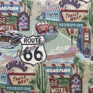 May include: A colorful tapestry featuring a Route 66 theme with a vintage car, motel signs, and a gas station. The text "Get Your Kicks on Route 66" is prominently displayed on a large, round sign.