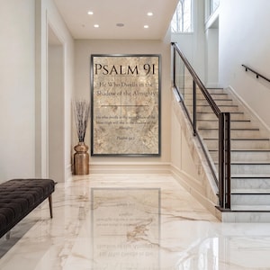 May include: A rectangular wall art piece featuring a beige marble-textured background with dark brown text that reads: PSALM 91, He Who Dwells in the Shadow of the Almighty, He who dwells in the secret place of the Most High will rest in the shadow of the Almighty, Psalm 91:1.