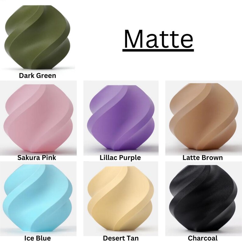 Puede incluir: Seis objetos decorativos de forma de remolino, con un acabado mate, en seis colores diferentes. Los colores son verde oscuro, rosa sakura, lila p&uacute;rpura, marr&oacute;n latte, azul hielo y carb&oacute;n.