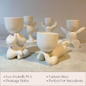 May include: Five white ceramic planters shaped like human figures in various poses. The planters have drainage holes and are ideal for succulents.