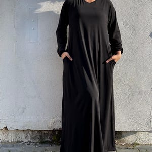 Elegante y con clase, liso, negro, marrón, más colores, vestido largo de jersey, abaya con bolsillos, vestido largo clásico Aline con estilo elegante y práctico.