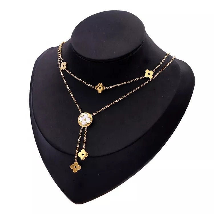 LOUIS VUITTON BLACK AND GOLD CHARM NECKLACE, 17” - alizeegarments