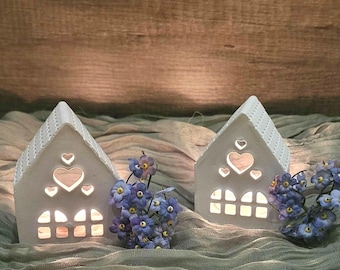 Plaster house with tea light