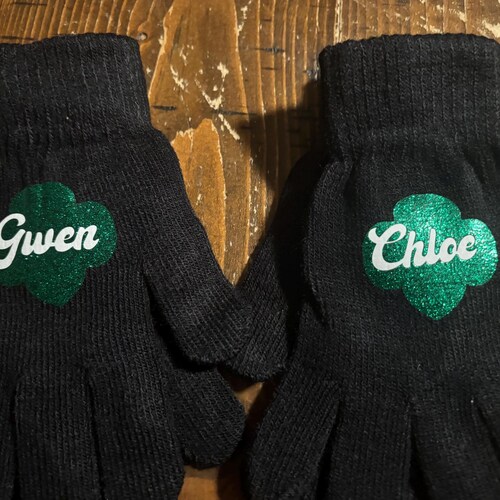 Pfadfinderin Handschuhe. Schwarze Handschuhe