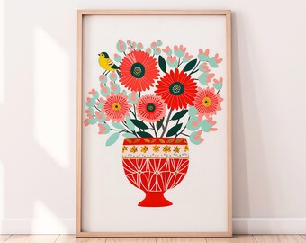 May include: A framed print of a stylized illustration of a bouquet of red and pink flowers in a red and white patterned vase with a yellow bird perched on the rim. The background is white.