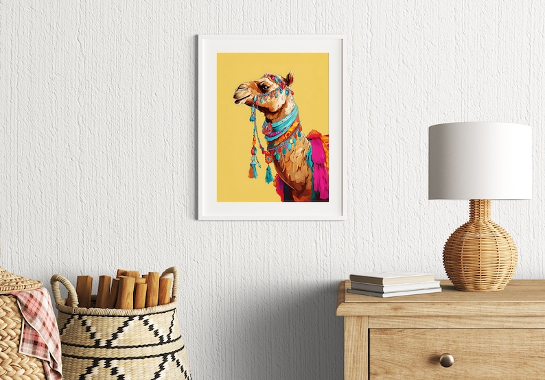 May include: A colorful illustration of a camel wearing a decorative headpiece and a colorful scarf. The camel is set against a yellow background.