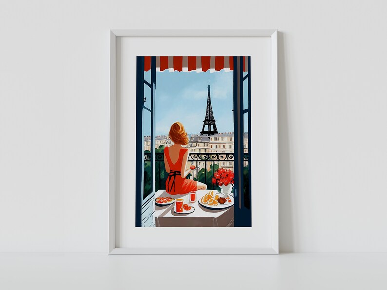 Pode incluir: Uma mulher de vestido vermelho senta-se em uma varanda com vista para a Torre Eiffel em Paris, Fran&ccedil;a. Ela est&aacute; desfrutando de uma refei&ccedil;&atilde;o com um copo de vinho e um prato de frutas. A varanda &eacute; decorada com flores vermelhas.