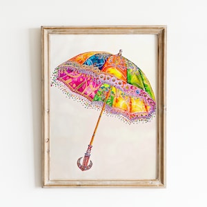 Op de afbeelding: Een kleurrijke, gepatroneerde paraplu met een houten handvat. De paraplu is versierd met kralen en pailletten. De paraplu is ingelijst in een licht houten frame.