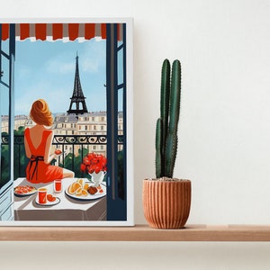 Pode incluir: Uma pintura de uma mulher com um vestido vermelho sentada &agrave; mesa com vista para a Torre Eiffel ao fundo. A mesa est&aacute; posta com um prato de comida, um copo de suco e um vaso de flores.