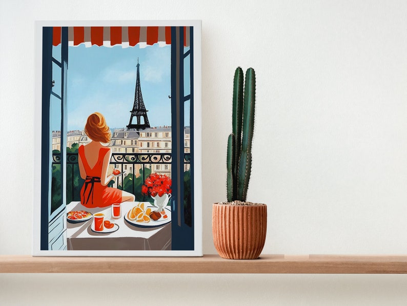 Pode incluir: Uma pintura de uma mulher com um vestido vermelho sentada &agrave; mesa com vista para a Torre Eiffel ao fundo. A mesa est&aacute; posta com um prato de comida, um copo de suco e um vaso de flores.