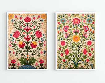 May include: Two framed prints of floral designs with a white background. The prints feature intricate patterns of red, yellow, and blue flowers with green leaves.