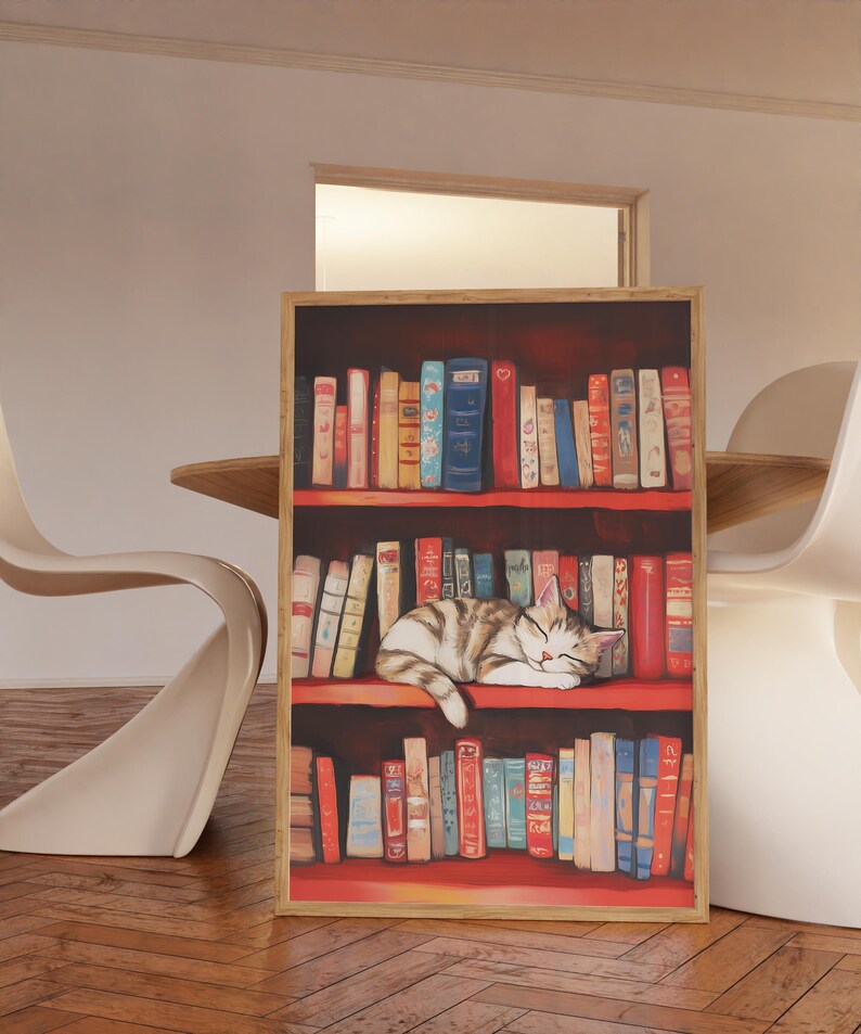May include: A painting of a cat sleeping on a bookshelf filled with colorful books. The cat is brown and white and is lying on its side with its head resting on the books. The bookshelf is red and has three shelves. The books are all different sizes and colors.