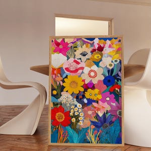May include: A colorful framed print featuring a vibrant floral design. The print showcases a variety of flowers in shades of pink, red, yellow, blue, and green, creating a lively and cheerful atmosphere.