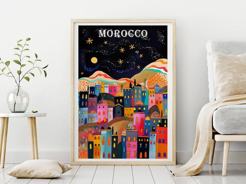May include: A colorful illustration of a city skyline at night with the word "MOROCCO" at the top. The city is filled with colorful buildings, a crescent moon, and stars in the night sky.