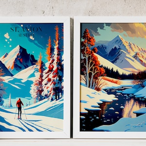 May include: Two framed prints of winter landscapes. The left print shows a skier in a red jacket on a snowy mountain slope with the text "ST. ANTON AUSTRIA". The right print shows a snowy mountain scene with a river winding through the valley.