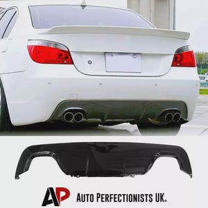 May include: A white car's rear with a spoiler and twin exhaust pipes. A glossy black rear diffuser is shown below. The text "AP AUTO PERFECTIONISTS UK." is printed in red and black.
