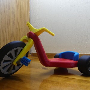 Big Wheel-inspirerad, fullt fungerande modell