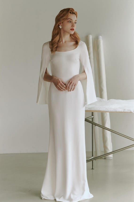 navy blue dress for baby girl 20 Winter Wedding Dress Ideas for Brides main image 0