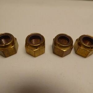 3/8-24 brass stop nut Nylock Nut. NEW. VINTAGE 1950&#39;s. Made in the USA. Quantity of 4