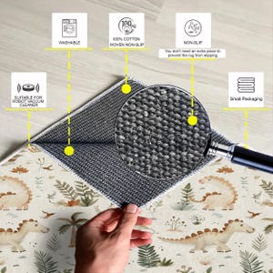 May include: A rug with a dinosaur pattern, featuring beige and green colors. The rug is made of 100% cotton and is non-slip. It is washable and suitable for robot vacuum cleaners. The rug is packaged in a small package.