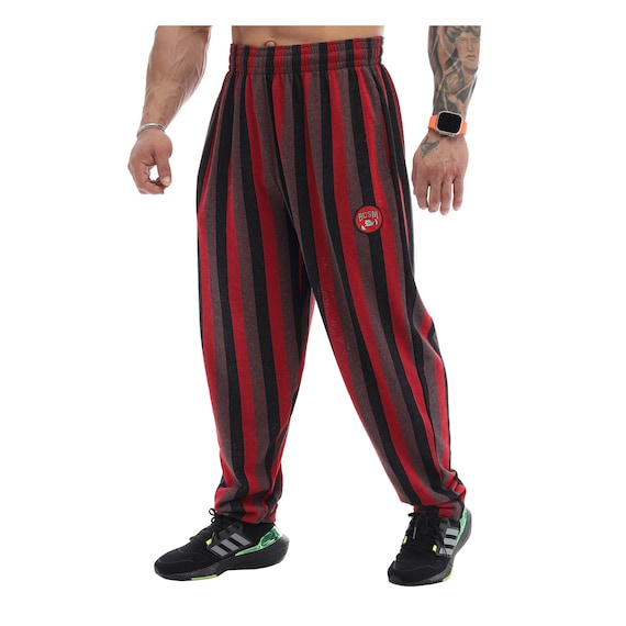 BAGGY TRAININGSBROEK - Zwart | Officiële Shop