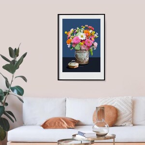 Zinnas in a summer bouquet and a tin bucket.