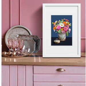 Zinnas in a summer bouquet and a tin bucket.