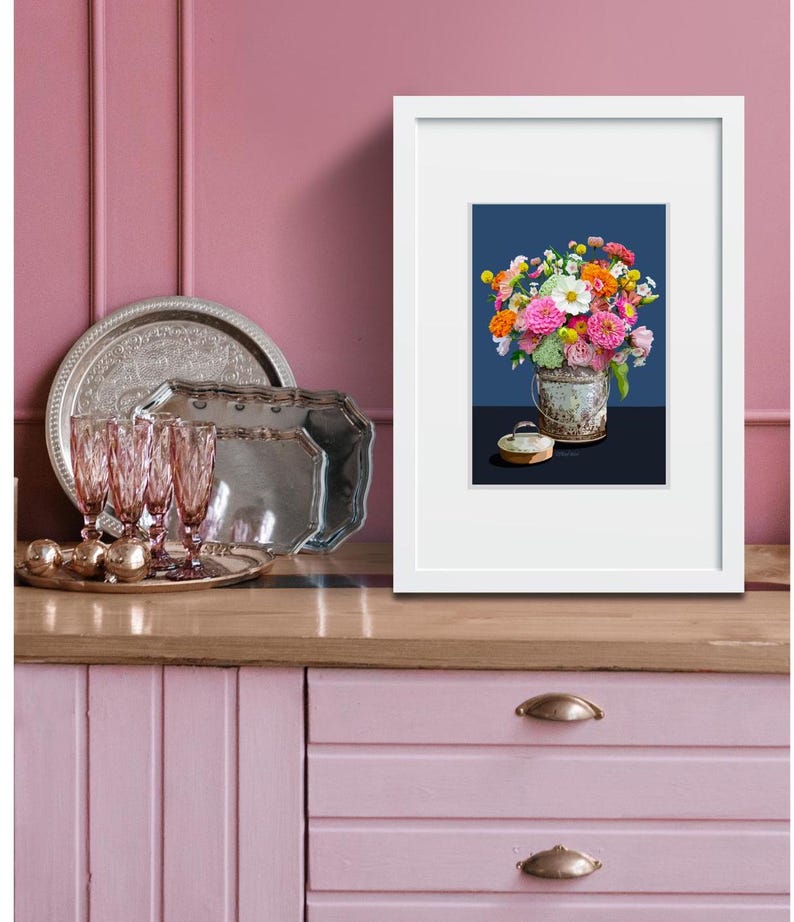 Zinnas in a summer bouquet and a tin bucket.