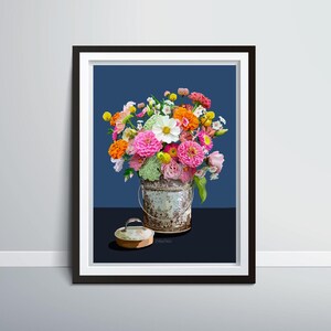 Zinnas in a summer bouquet and a tin bucket.