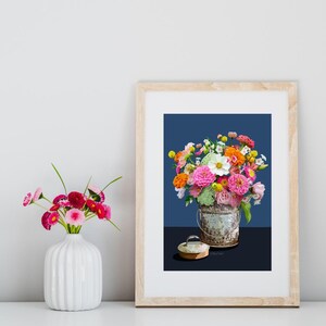 Zinnas in a summer bouquet and a tin bucket.