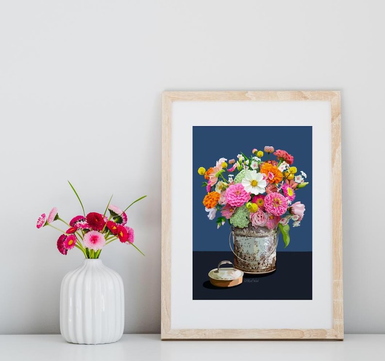 Zinnas in a summer bouquet and a tin bucket.