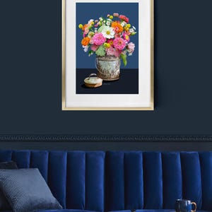Zinnas in a summer bouquet and a tin bucket.