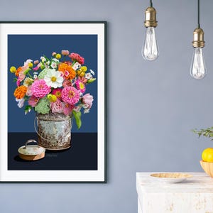Zinnas in a summer bouquet and a tin bucket.