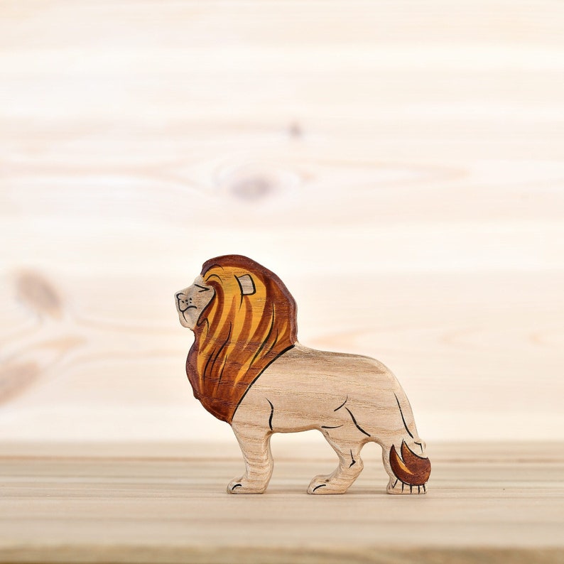 Handcrafted-wooden-lion-toy, Eco-friendly-animal-plaything, Wooden-child's-gift, Safari-themed-toy, Lion-wood-carving, Montessori-inspired-toy, Sustainable-wooden-toy, Unique-birthday-gift, Playroom-decoration, Lion-sculpture-for-kids