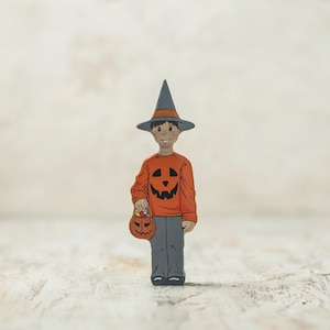 Hand-Painted Wooden Pumpkin Boy Figurine: Halloween Decor