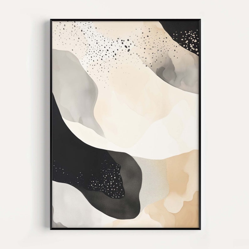 Op de afbeelding: Abstracte kunstprint met zwarte, witte en beige vormen en een gespikkeld patroon. De print is ingelijst in een zwart frame.
