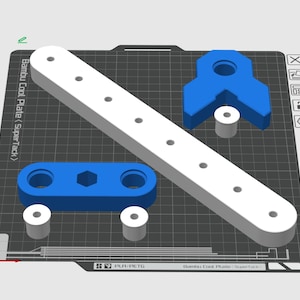 May include: A 3D-rendered image of white and blue 3D-printed parts. The parts include a long white bar with holes, two blue pieces, and several small gray cylinders. The text "Bambu Cool Plate (SuperTack)" is visible.