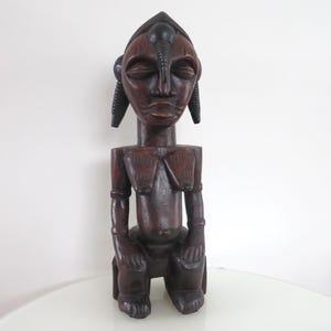 African female tribal statue Katyeleo of Senoufo ethnic group, Ivory Coast