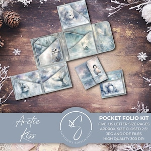 May include: A pocket folio kit with five US letter size pages. The kit features watercolor illustrations of arctic animals and landscapes in shades of blue and gray. The closed size is approximately 2.5 inches. The text "Arctic Kiss" is also visible.